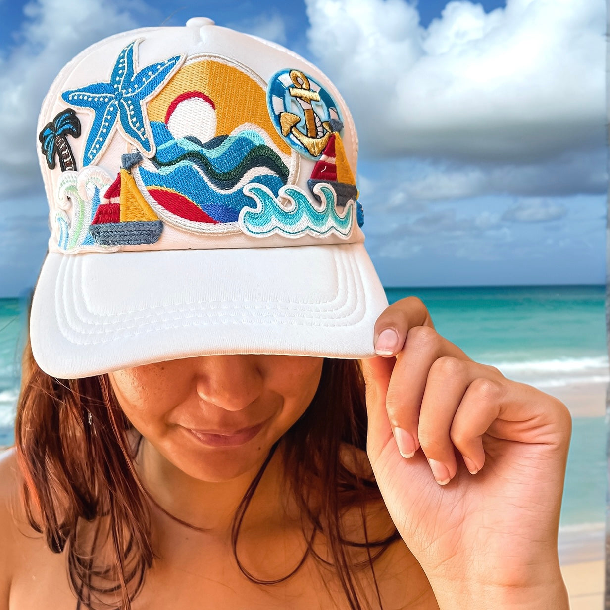 White trucker cap with Nautical applique